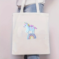 Strijkembleem unicorn op regenboog