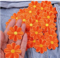 Strijkemblemen bloemen oranje 10 stuks